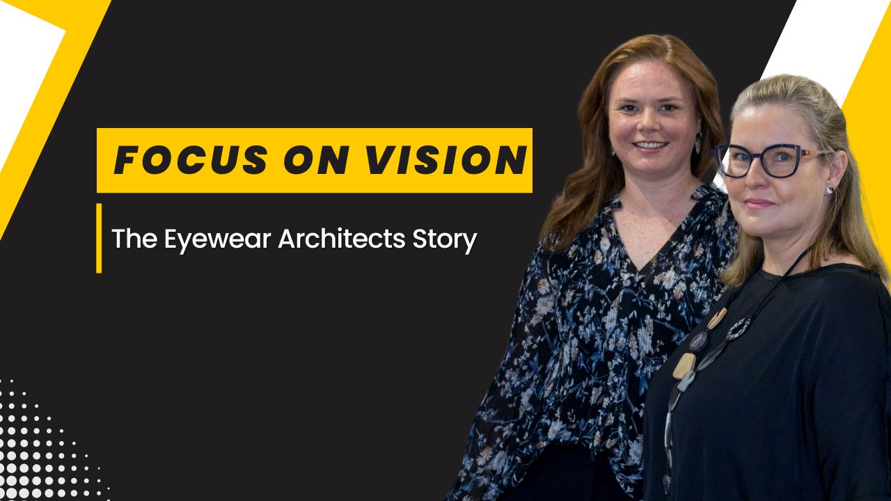 Two professional women, one with red hair and the other with glasses, with text overlay: Focus on Vision - The Eyewear Architects Story.