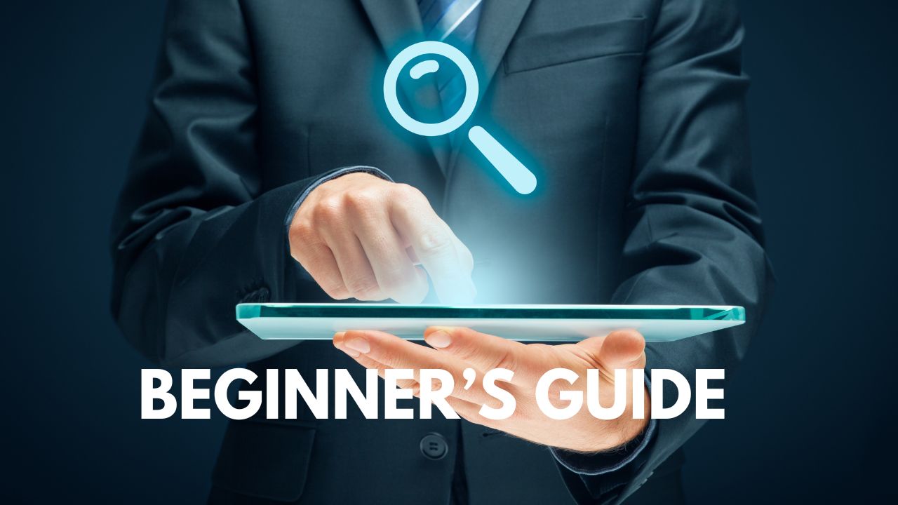 Businessman using a transparent digital tablet with a magnifying glass icon and text overlay: Beginner’s Guide.