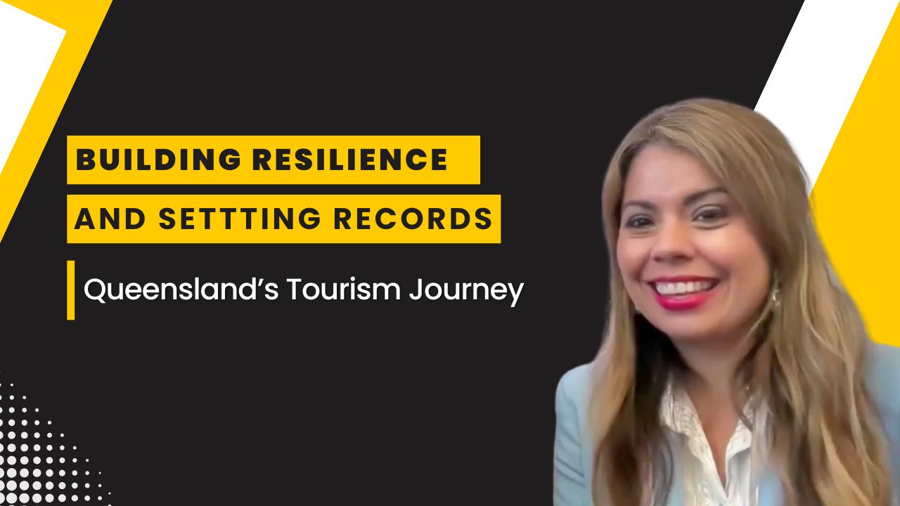 Smiling woman in professional attire with text overlay: Building Resilience and Setting Records - Queensland's Tourism Journey
